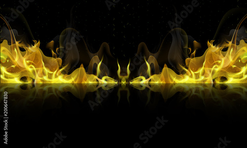yellow fire with reflection on a black background