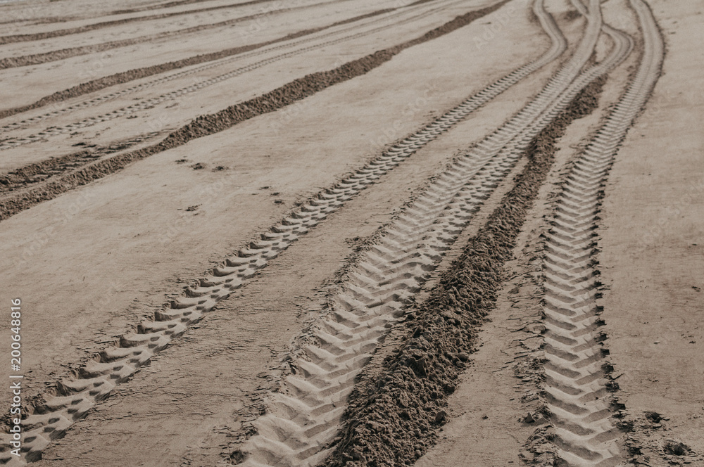 Naklejka premium Sand tracks