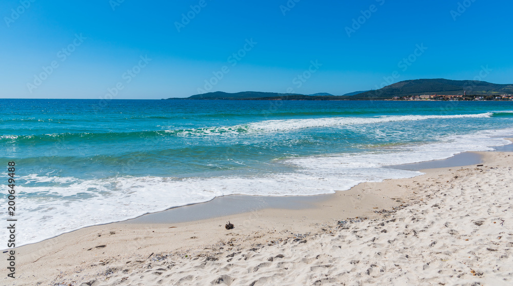 Blue sea in Maria Pia beach in Alghero