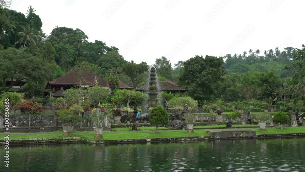 tirta ganga beautiful water palace green park in bali indonesia, fountain stream, wonderful nature landscape, place for meditation and relaxation tirta ganga beautiful water palace green park in bali indonesia, fountain stream, wonderful nature landscape, place for meditation and relaxation