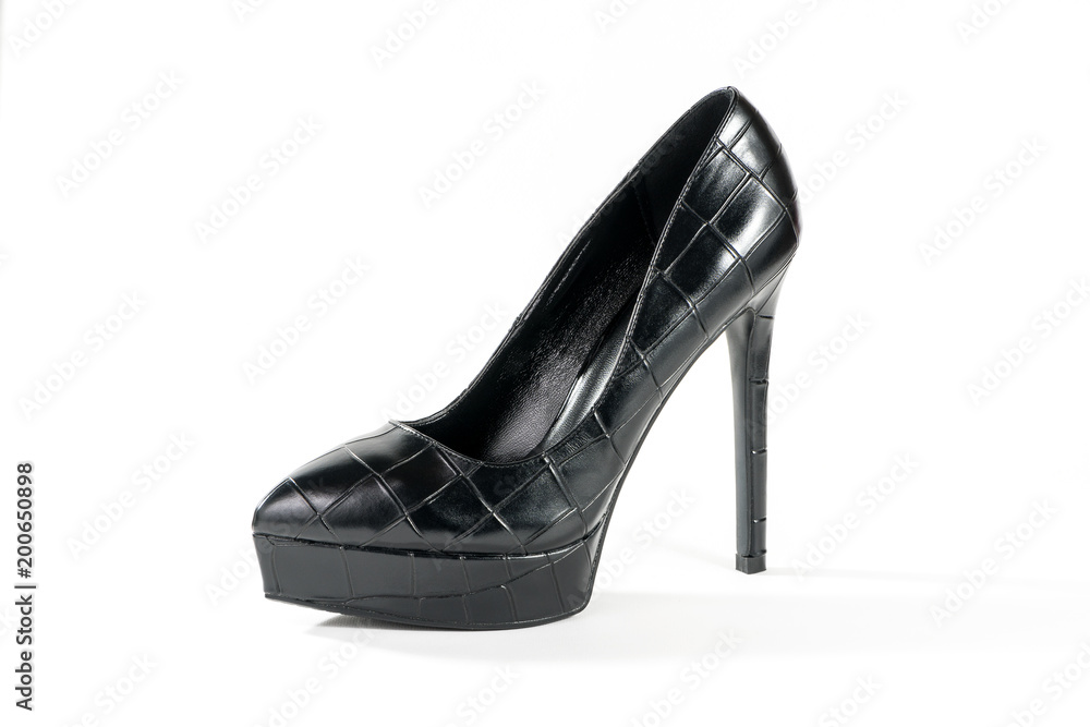Black high heels isolated on a white background with clipping path for design..Luxury high heels. Black and White. Contrast. Black high heels isolated on a white background with clipping path for design..Luxury high heels. Black and White. Contrast.