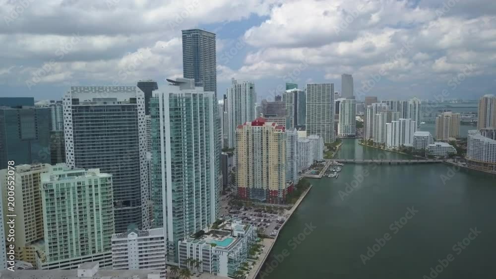 alt overcast day flying forward along downtown Miami waterfront alt overcast day flying forward along downtown Miami waterfront