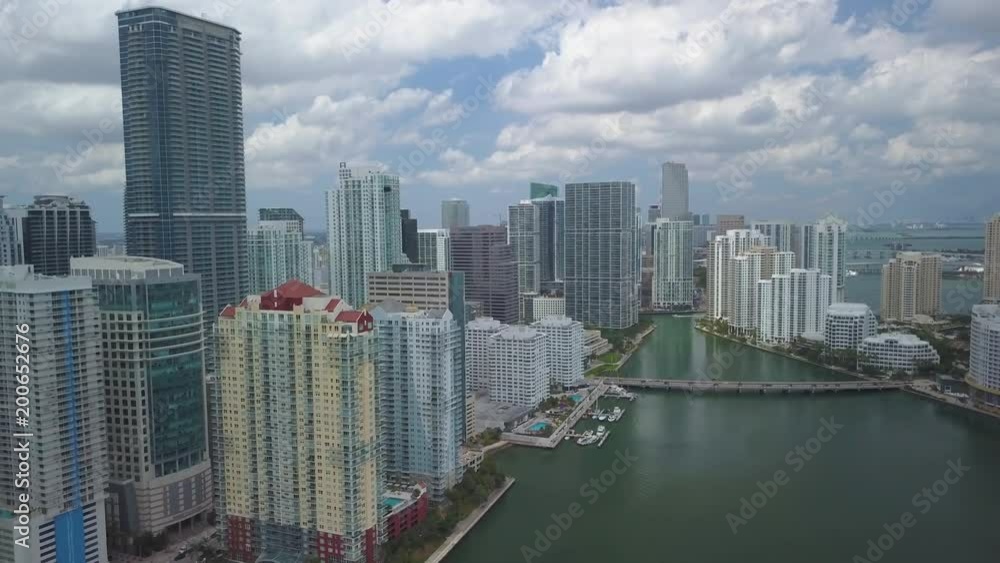 overcast day flying forward along downtown Miami waterfront overcast day flying forward along downtown Miami waterfront