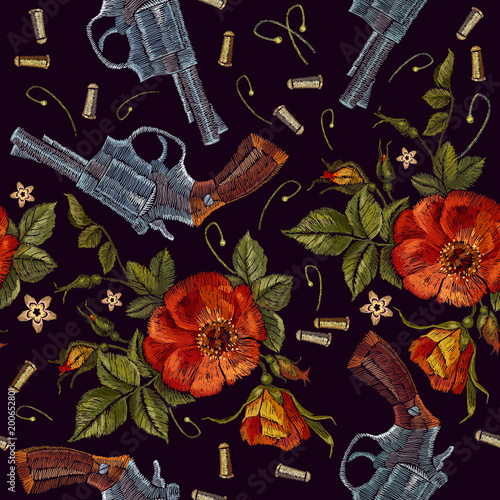 Embroidery old guns and red roses seamless pattern. Romantic embroidery old revolvers, roses, gangster gothic pattern