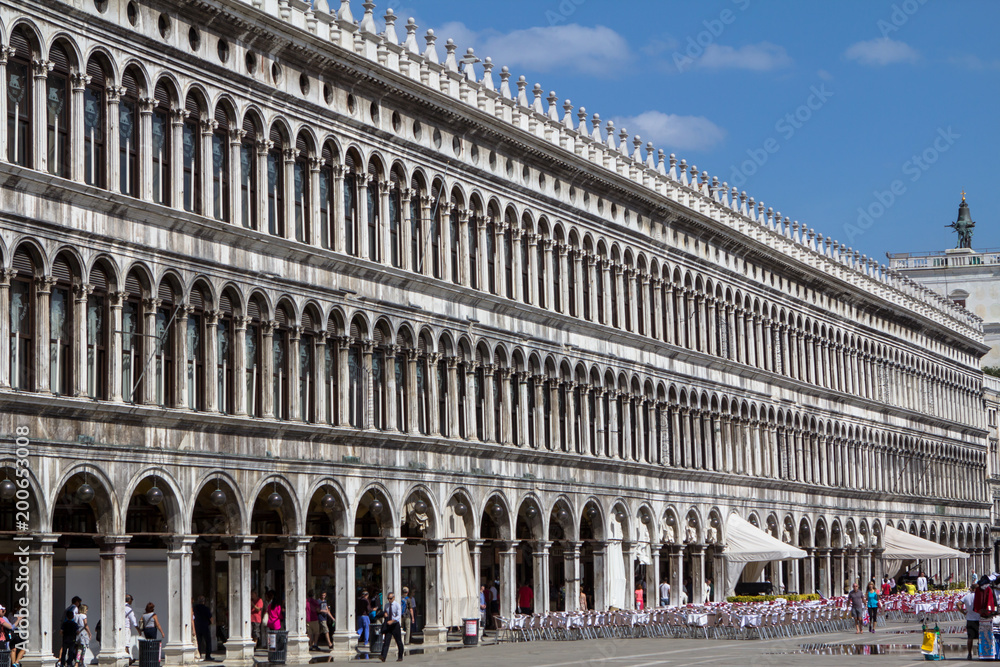 Fototapeta premium Arcades of the facade on Piazza San Marco in Venice, Italy