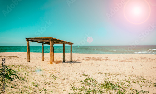 Wooden gazebo on the beach