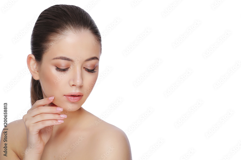 Portrait of a beautiful young woman, skin care and hands with manicure Portrait of a beautiful young woman, skin care and hands with manicure