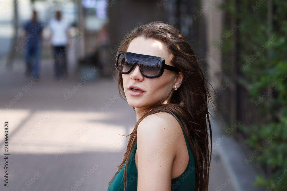 Beautiful sexy cute girl in trendy sunglasses
Beautiful sexy cute girl in trendy sunglasses