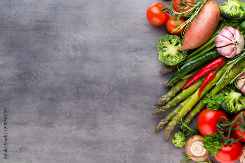 Flat lay of various colorful raw vegetables.