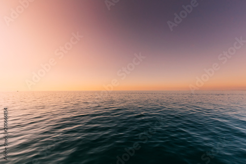 Sea Or Ocean And Colorful Sunset Or Sunrise Sky Background