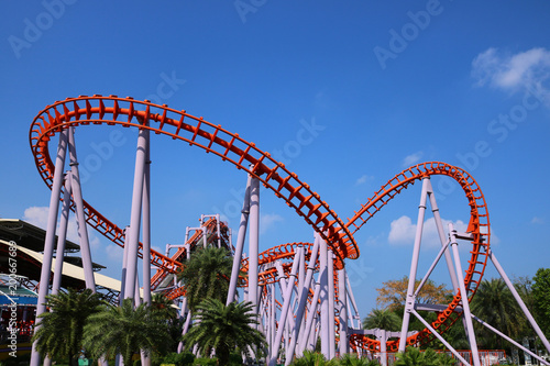 roller coaster with blue sky