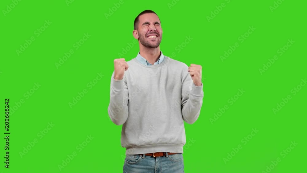 Happy young man with a gesture of celebration Happy young man with a gesture of celebration