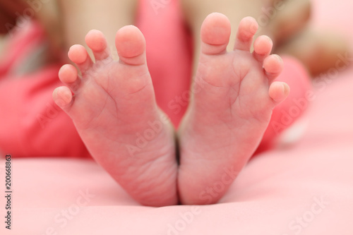 Close up of newborn baby feet © godsandkings