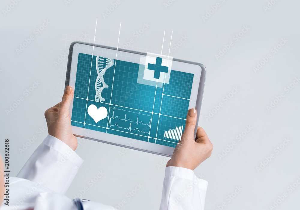Close of female doctor hands working with tablet pc computer Close of female doctor hands working with tablet pc computer