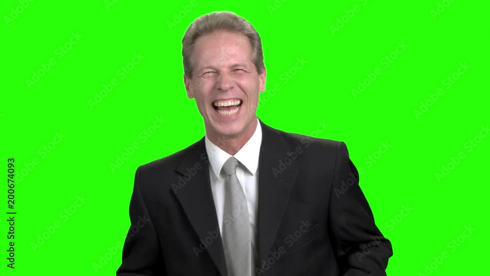 Successful corporate male. Amazed excited businessman doesn`t believe his success. Emotional glad laughing with open mouth businessman. Successful corporate male. Amazed excited businessman doesn`t believe his success. Emotional glad laughing with open mouth businessman.