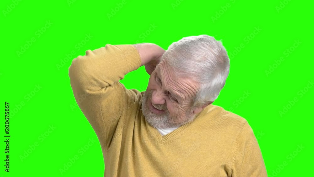 Elderly man with terrible neckache. Stressed senior man with terrible neck pain on chroma key background. Elderly man with terrible neckache. Stressed senior man with terrible neck pain on chroma key background.