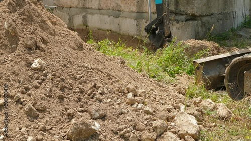 Wallpaper Mural Hydraulic bucket lifts the ground Torontodigital.ca