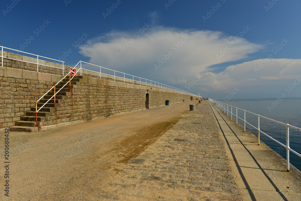 St Catherines breakwater, Jersey, U.K
Wide angle image of a 19th century pier with a Cumulus cloud above.