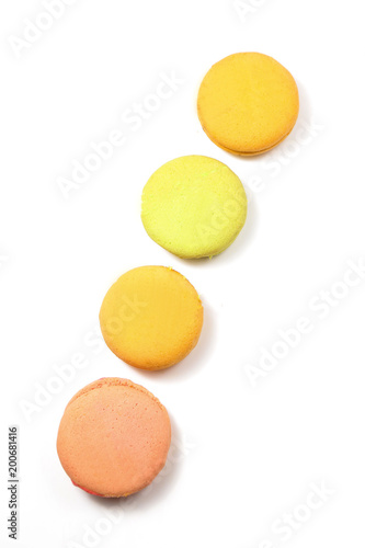 Delicious four multicolored macaroon isolated on white background