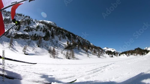 super slow motion cross country skier skating on ski run
 photo