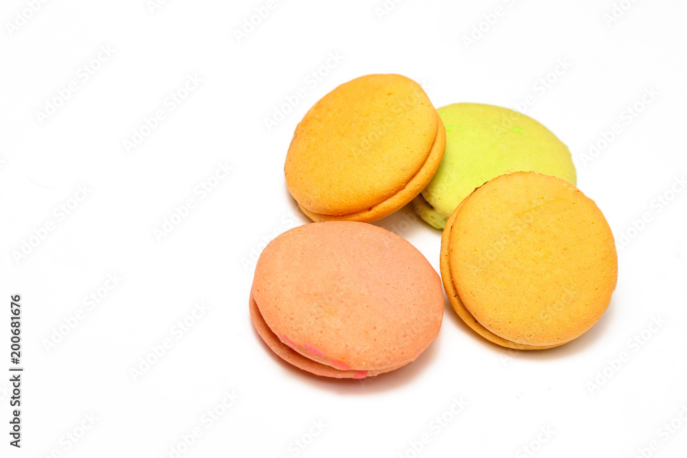 Delicious four multicolored macaroon isolated on white background Delicious four multicolored macaroon isolated on white background
