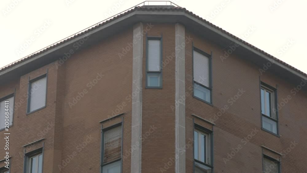 Corner brick building with windows in Trieste Corner brick building with windows in Trieste