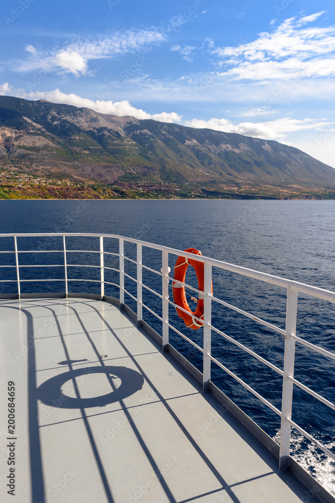 Obraz premium Open deck of a cruise ship in sunny summer day. Greece