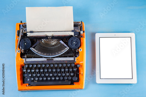 Workspace with vintage orange typewriter