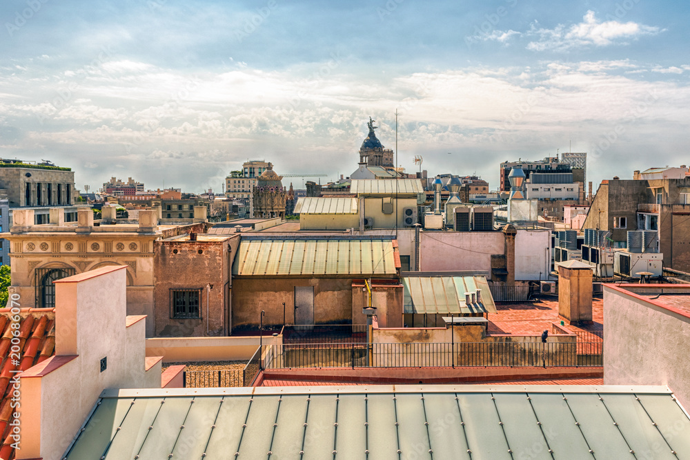 Fototapeta premium Aerial view over the rooftops of central Barcelona, Catalonia, Spain