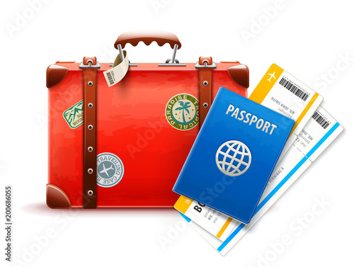 Retro suitcase passport and airline tickets for travel.