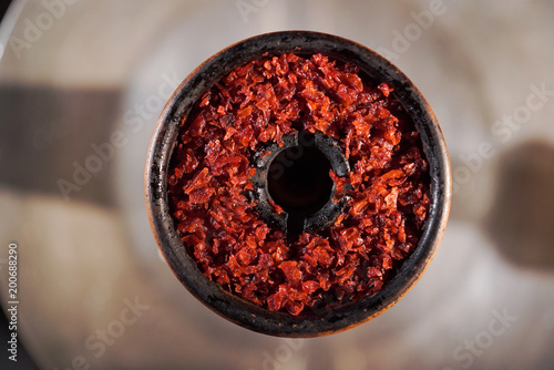 Red tobacco in hookah shisha bowl