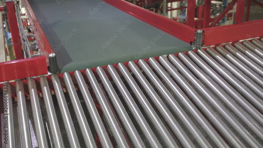 Empty Transport Rollers and Conveyor Belt in Warehouse Empty Transport Rollers and Conveyor Belt in Warehouse