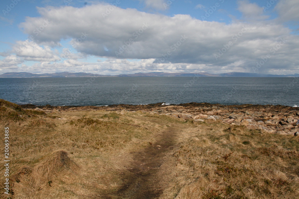 Coastline at Tarbat Ness Lighthouse, Scottish Highlands, Dornach Firth, Scotland Coastline at Tarbat Ness Lighthouse, Scottish Highlands, Dornach Firth, Scotland