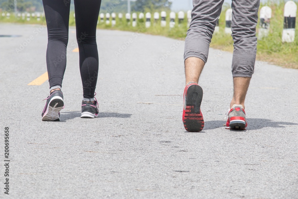 Couple is jogging exercise in the morning Couple is jogging exercise in the morning