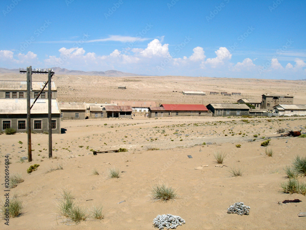 Abandoned buildings in the diamond mining town of Kolmanskop, Namibia Abandoned buildings in the diamond mining town of Kolmanskop, Namibia