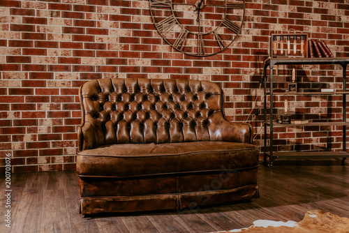 light brown leather sofa in industrial style decoration