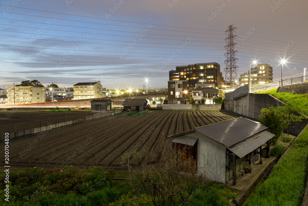 Small urban farm next to apartment buildings in Suita, Esaka