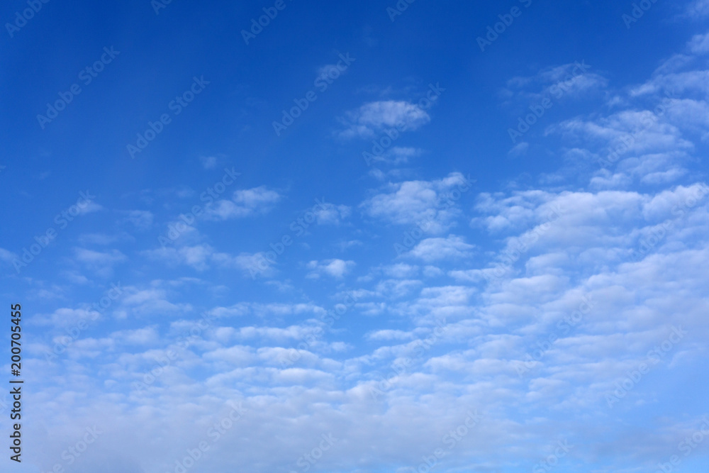 clouds Cirrus occupying the upper part of the frame and in the background a sky of deep blue color, poa, sp, brazil .
