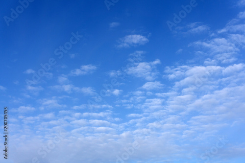clouds Cirrus occupying the upper part of the frame and in the background a sky of deep blue color, poa, sp, brazil .