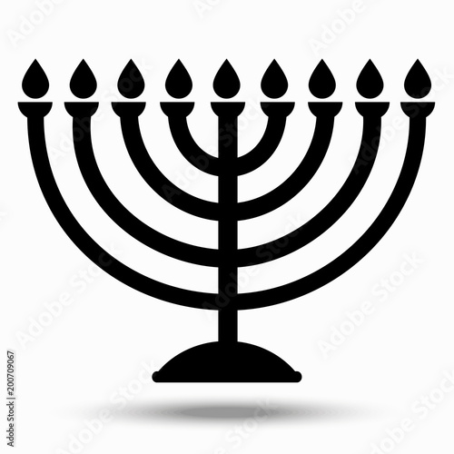 Фотография Chanukiah - a symbol of the Jewish holiday of Hanukkah - Day of Atonement