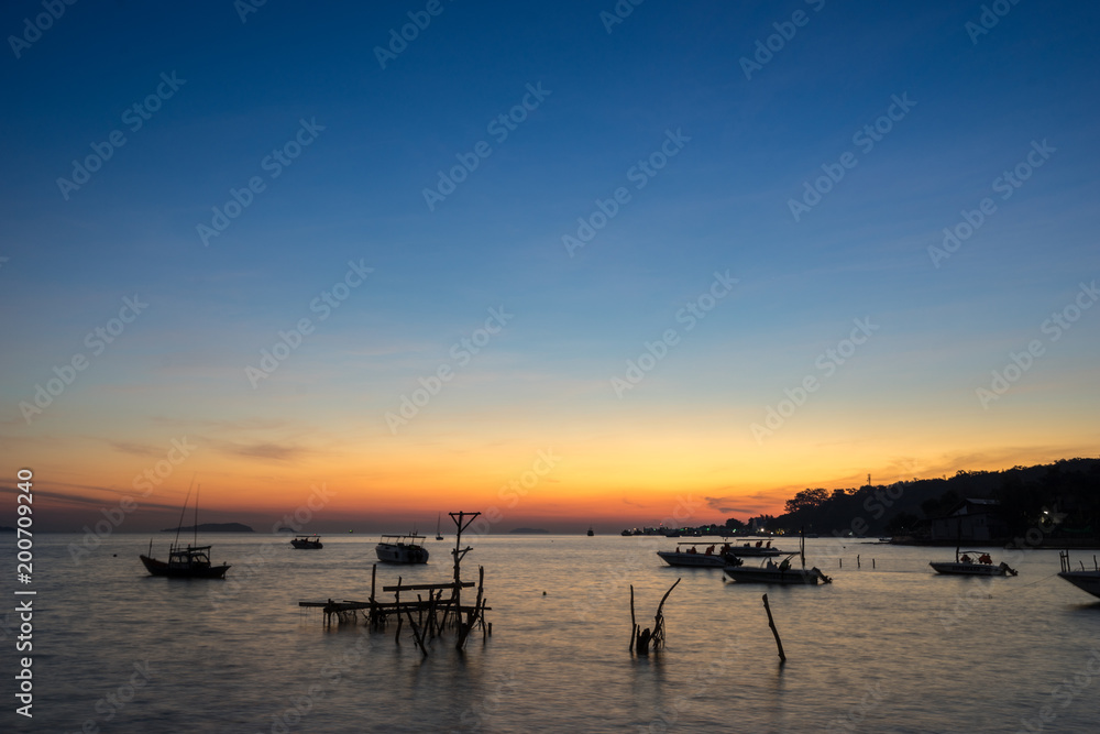 scenic of sunrise morning on the fisherman village in sea