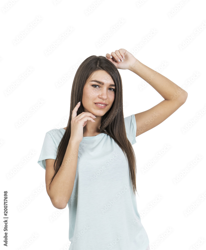 Attractive young woman in a T shirt, isolated Attractive young woman in a T shirt, isolated