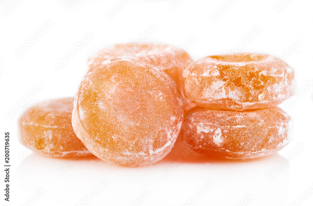 Colored round candy in powdered sugar. Bright candy. Colored round candy in powdered sugar. Bright candy.
