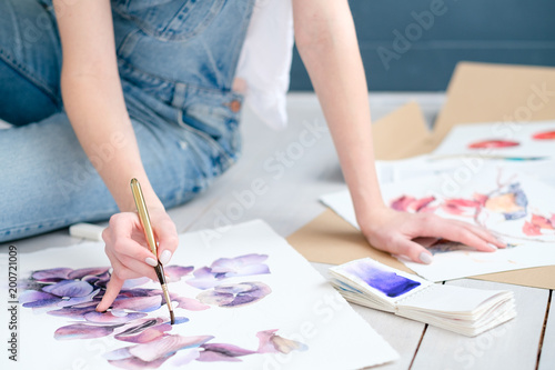 inspiration art creation. painting hobby. woman drawing beautiful floral watercolor design