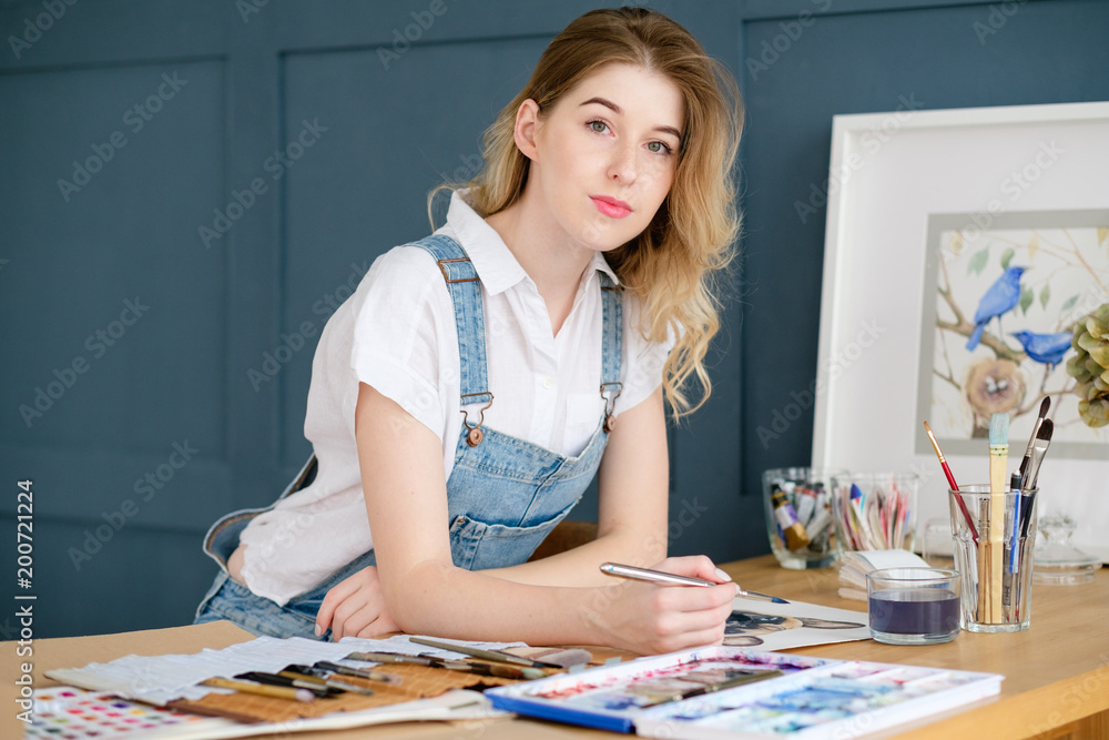 Fototapeta premium art painting hobby. creative leisure. girl drawing a picture. talent inspiration creation and self expression concept