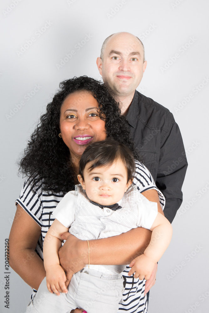Portrait of mixed race multiracial family with one boy son child Portrait of mixed race multiracial family with one boy son child