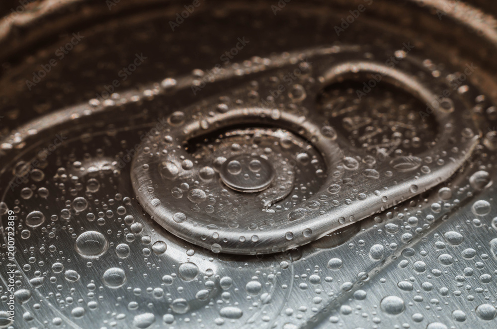 Water droplets on top of the aluminum can. Macro.