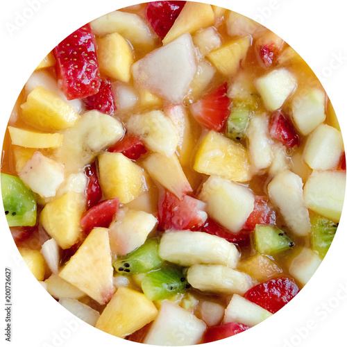 closeup of real organic fruit salad, circle shape of fresh food with juice