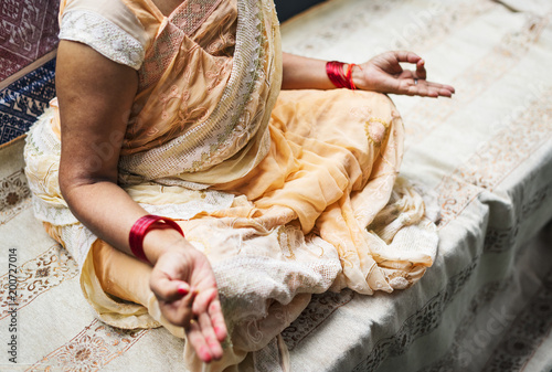 A meditating Indian woman photo