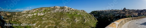 Views of the Caves in the Gravina and Sassi on Blue Sky Background in a Sunny Day. Matera, South of Italy